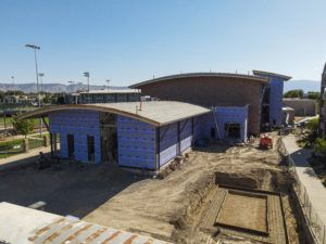 Photo of the rear of CMU's new Kineciology building during construction.